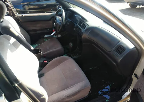 1995 Toyota Corolla Le/Dx z USA, uszkodzony, nr VIN 2T1AE09B5SC121609